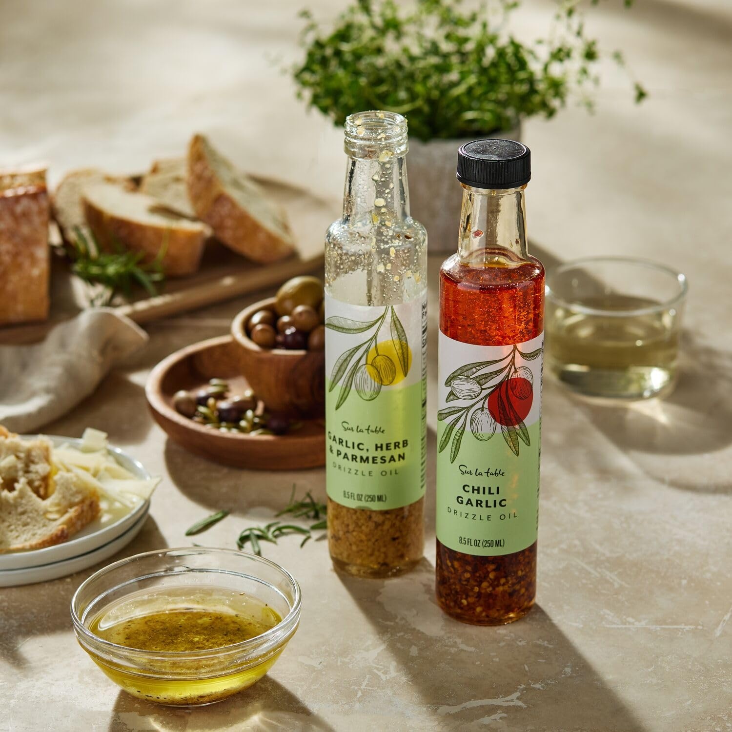 image:imageSur La Table Garlic Herb amp Parmesan Infused Olive Oil 85 fl oz Bottle with Zesty Garlic Bright Herbs amp Bold Cheese Flavor Perfect for Sauting Drizzling Dipping amp Vinaigrettes