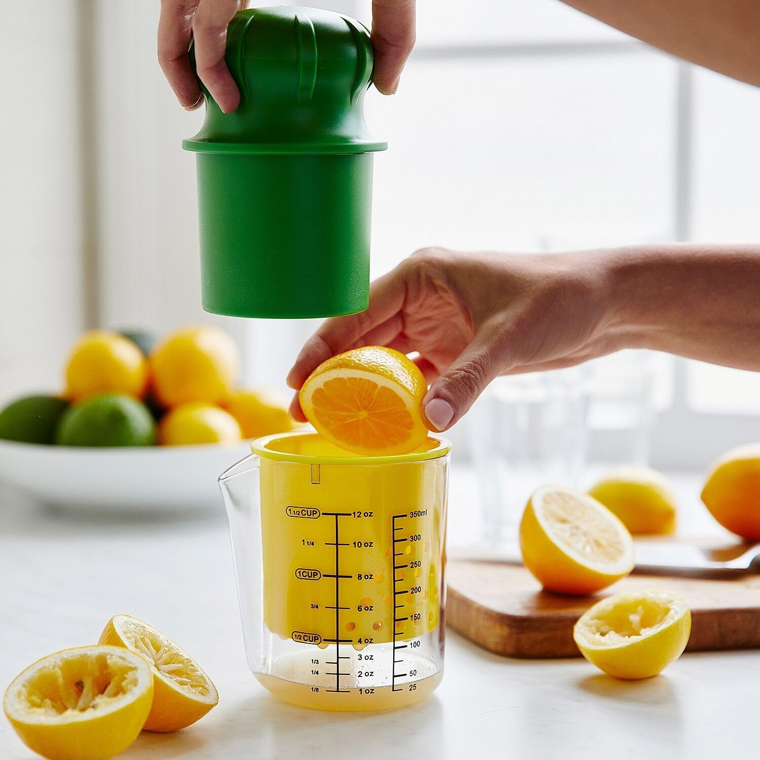 image:imageSur La Table Manual Citrus Juicer HighPerformance Hand Juicer with Clear Measuring Cup Yellow Reaming Cone Green Plunger amp Metal Prong for Maximum Juice Extraction