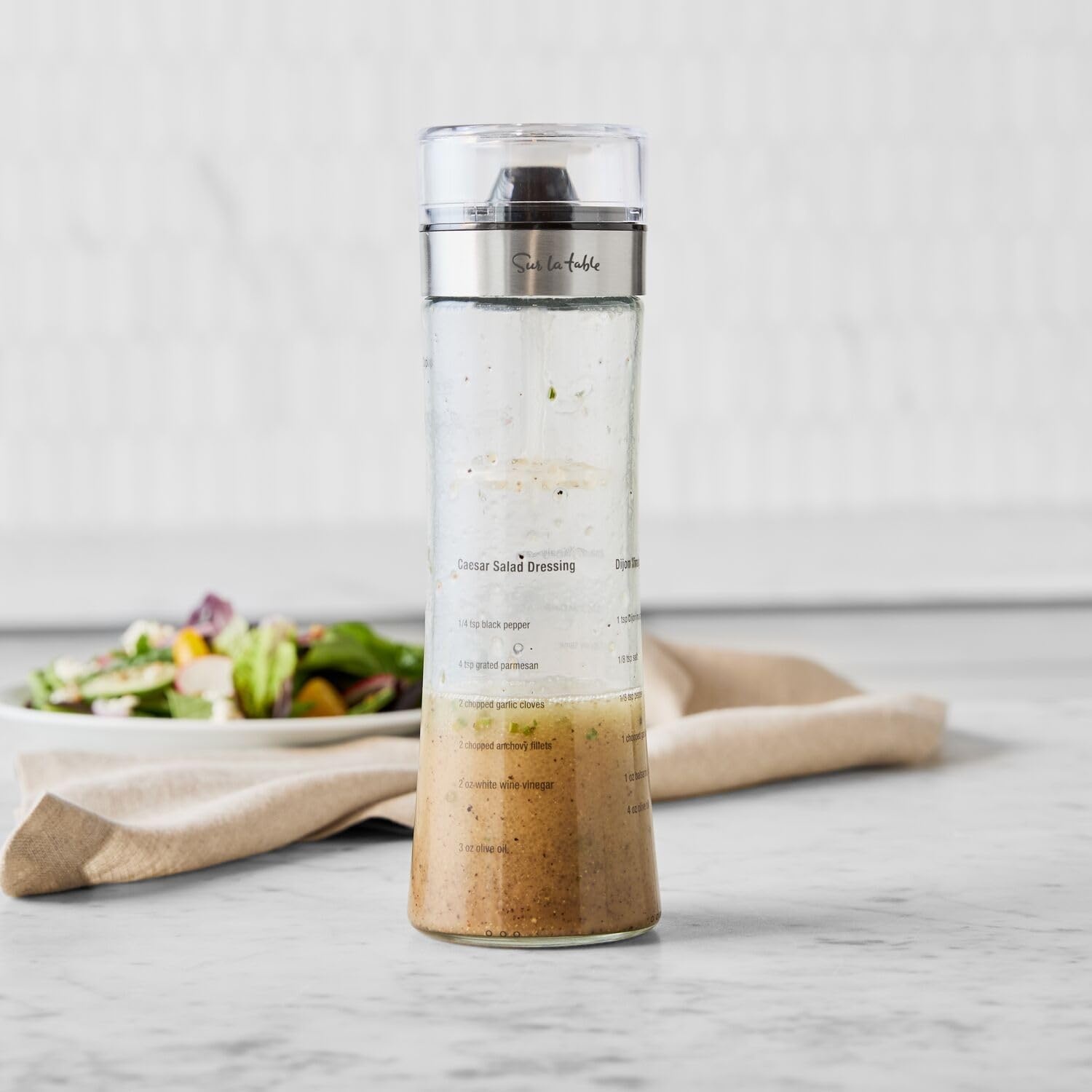image:imageSur La Table Salad Dressing Shaker 18 oz Glass Bottle with Emulsifying Wand Measurement Markings amp BuiltIn Recipes Mix Vinaigrettes amp Caesar Dressings Easily