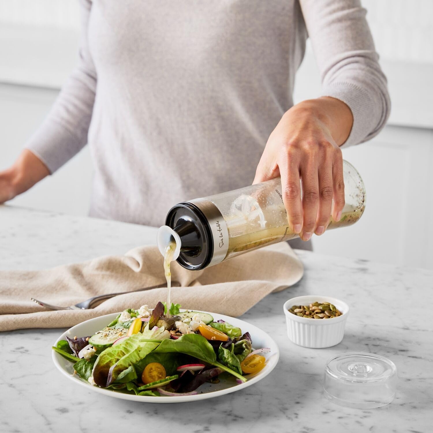 image:imageSur La Table Salad Dressing Shaker 18 oz Glass Bottle with Emulsifying Wand Measurement Markings amp BuiltIn Recipes Mix Vinaigrettes amp Caesar Dressings Easily