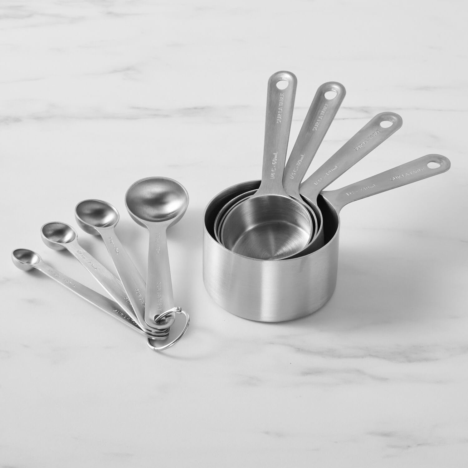image:imageSur La Table Stainless Steel Measuring Cups amp Spoons Set 8Piece Kitchen Baking Tool Set with Nesting Design EasyOpen Ring SpaceSaving Storage Sizes from tsp to 1 cup
