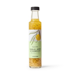 image:imageSur La Table Garlic Herb amp Parmesan Infused Olive Oil  85 fl oz Bottle with Zesty Garlic Bright Herbs amp Bold Cheese Flavor Perfect for Sauting Drizzling Dipping amp Vinaigrettes