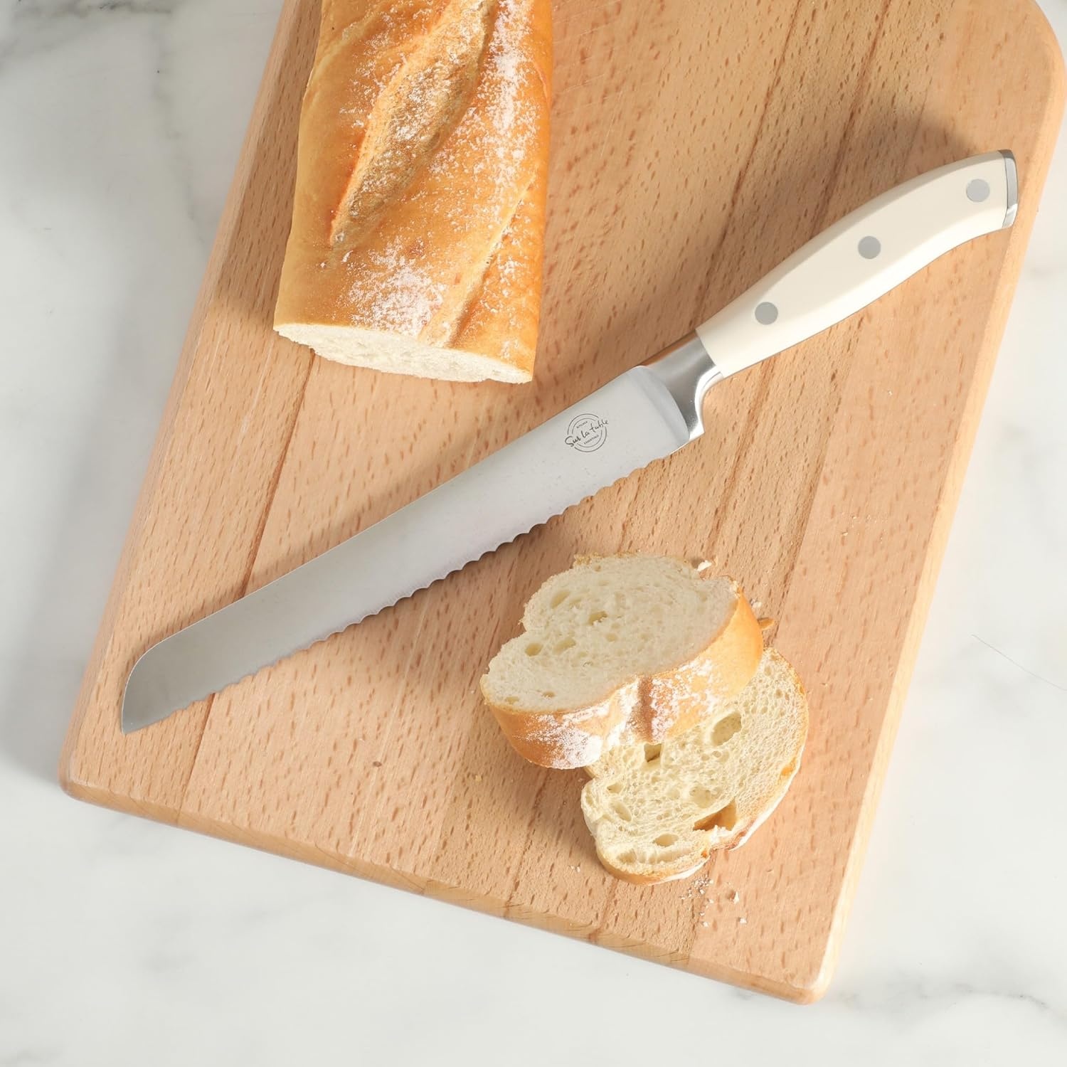 image:imageSur La Table Kitchen Essential Tasting Kitchen German Steel Bread Knife 8Inch Stainless Steel Blade Professional Kitchen Knife with White Handle and Forged Full Tang