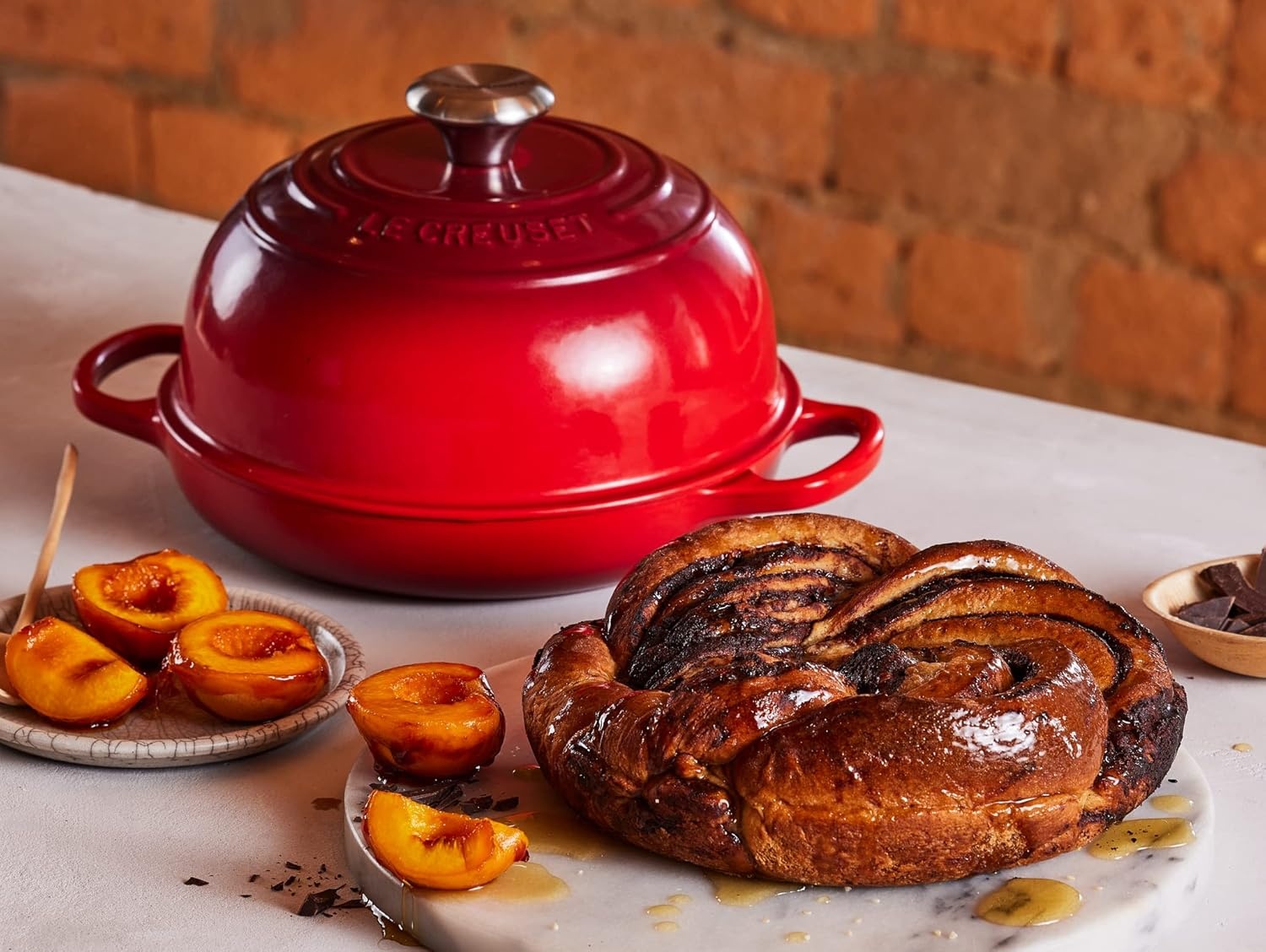 image:imageLe Creuset Enameled Cast Iron Signature Round Bread Oven 95 inch WhiteCerise