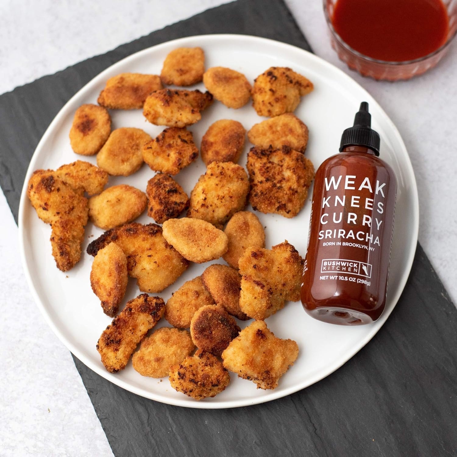 image:imageWeak Knees Gochujang Sriracha Hot Sauce Infused with Bold Korean Gochujang Paste amp Classic Spicy Sriracha for Noodles Rice amp Marinades Made in the USA 105oz Squeeze BottleCurry Sriracha 105oz