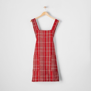 image:imageSur La Table Plaid Smock Apron Red FullCoverage Cotton Smock Apron with Classic Plaid Pattern Pockets and Tie Back