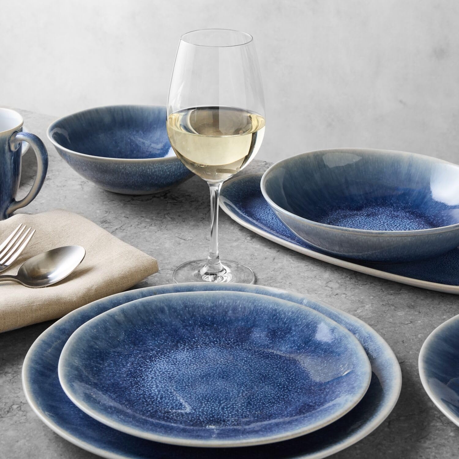 image:imageSur La Table Cloud Stoneware Dinnerware Set 12Piece Handcrafted Ceramic Collection Made in Portugal with Reactive Glaze Organic Design Dishwasher amp Microwave Blue