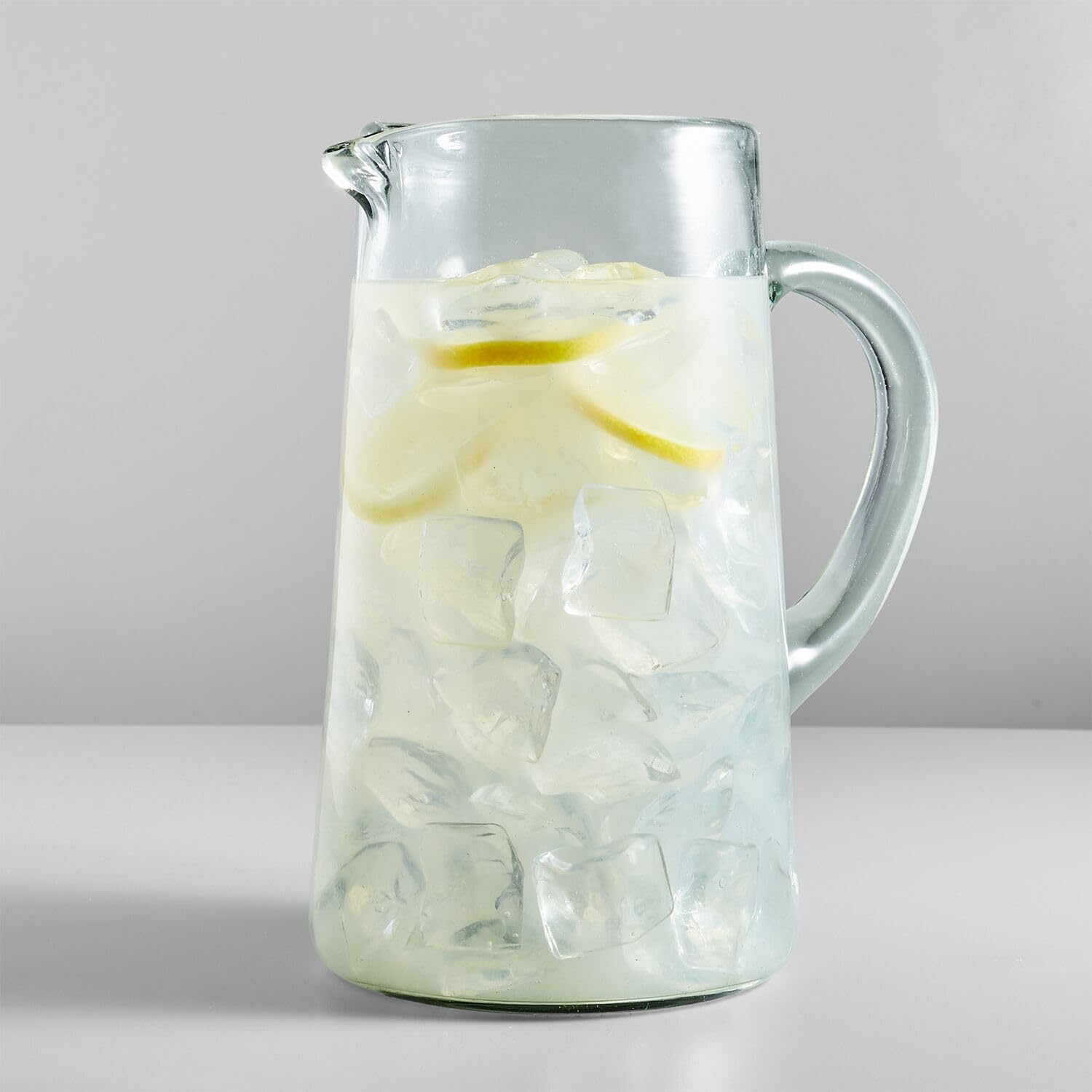 image:imageSur La Table Recycled Glass Pitcher Thoughtfully Made Handblown Recycled Glass Pitcher for Water Cocktails and Cold Beverages
