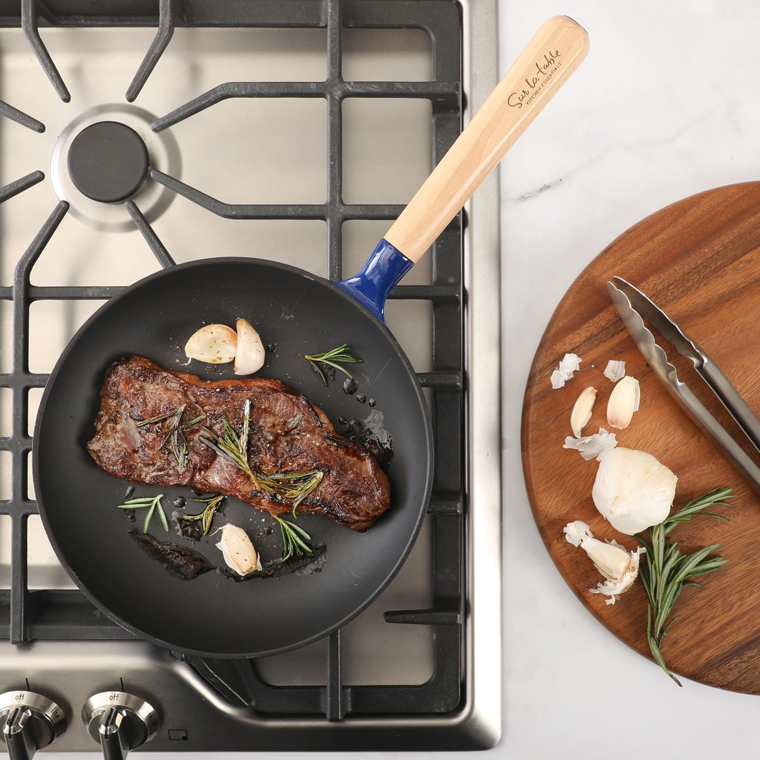 image:imageSur La Table Kitchen Essential Main Canteen 95 PreSeasoned Cast Iron Skillet wWood Handle Natural Nonstick Lightweight Frying Pan for Searing Sauting amp Everyday Cooking BlueBlue Skillet