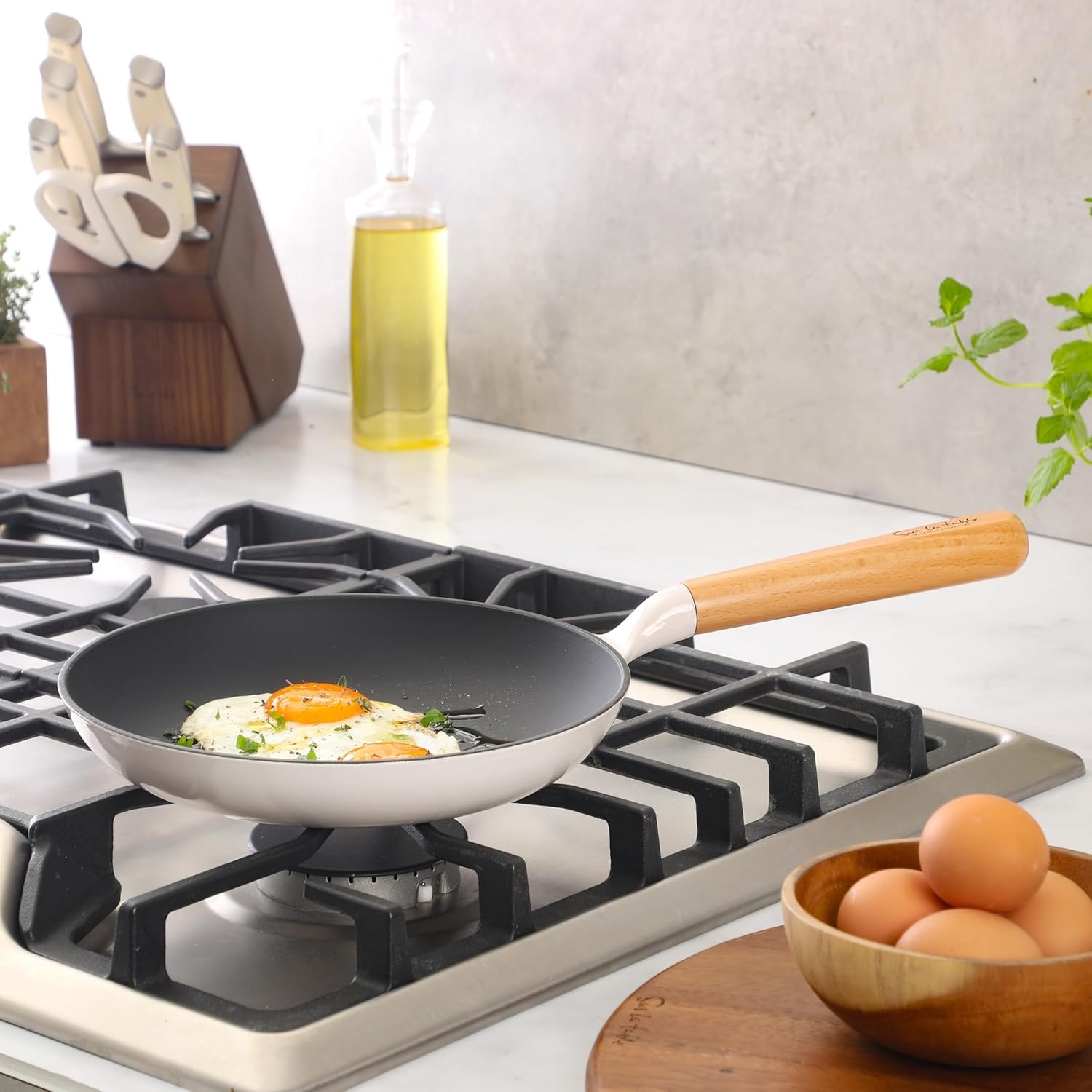 image:imageSur La Table Kitchen Essential Main Canteen 95 PreSeasoned Cast Iron Skillet wWood Handle Natural Nonstick Lightweight Frying Pan for Searing Sauting amp Everyday Cooking BlueEggshell White Skillet