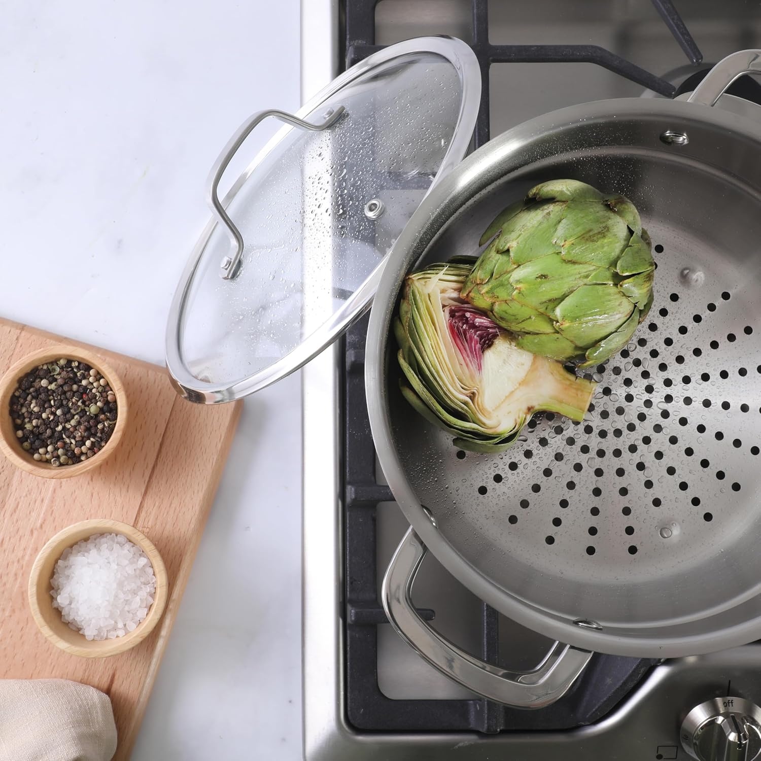 image:imageSur La Table Kitchen Essentials Chefs Deck 3Piece 53Quart Stainless Steel Dutch Oven with Steamer Insert amp Glass Lid Induction Ready TriPly Base Polished Finish amp Hollow StayCool HandlesStainless Steel