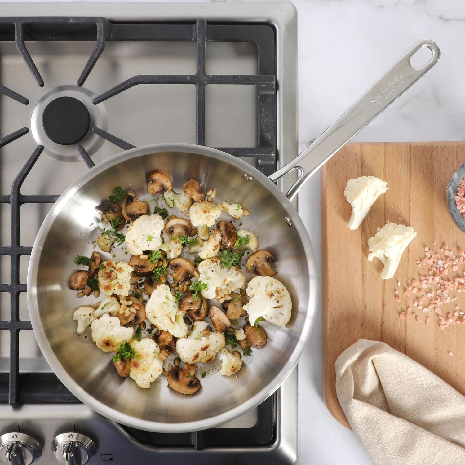 image:imageSur La Table Kitchen Essentials Chefs Deck 3Piece 53Quart Stainless Steel Dutch Oven with Steamer Insert amp Glass Lid Induction Ready TriPly Base Polished Finish amp Hollow StayCool HandlesStainless Steel