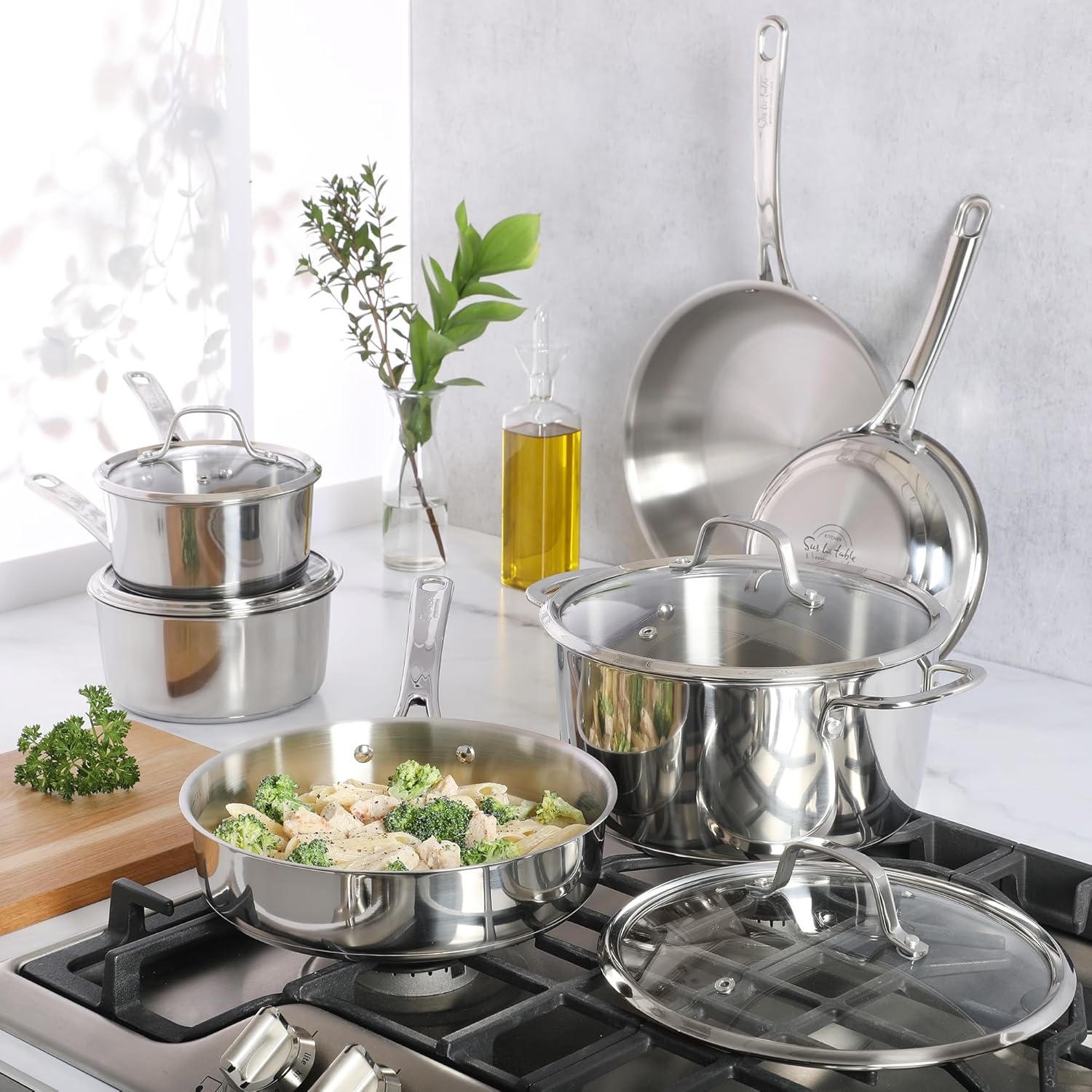 image:imageSur La Table Kitchen Essentials Chefs Deck 3Piece 53Quart Stainless Steel Dutch Oven with Steamer Insert amp Glass Lid Induction Ready TriPly Base Polished Finish amp Hollow StayCool HandlesStainless Steel