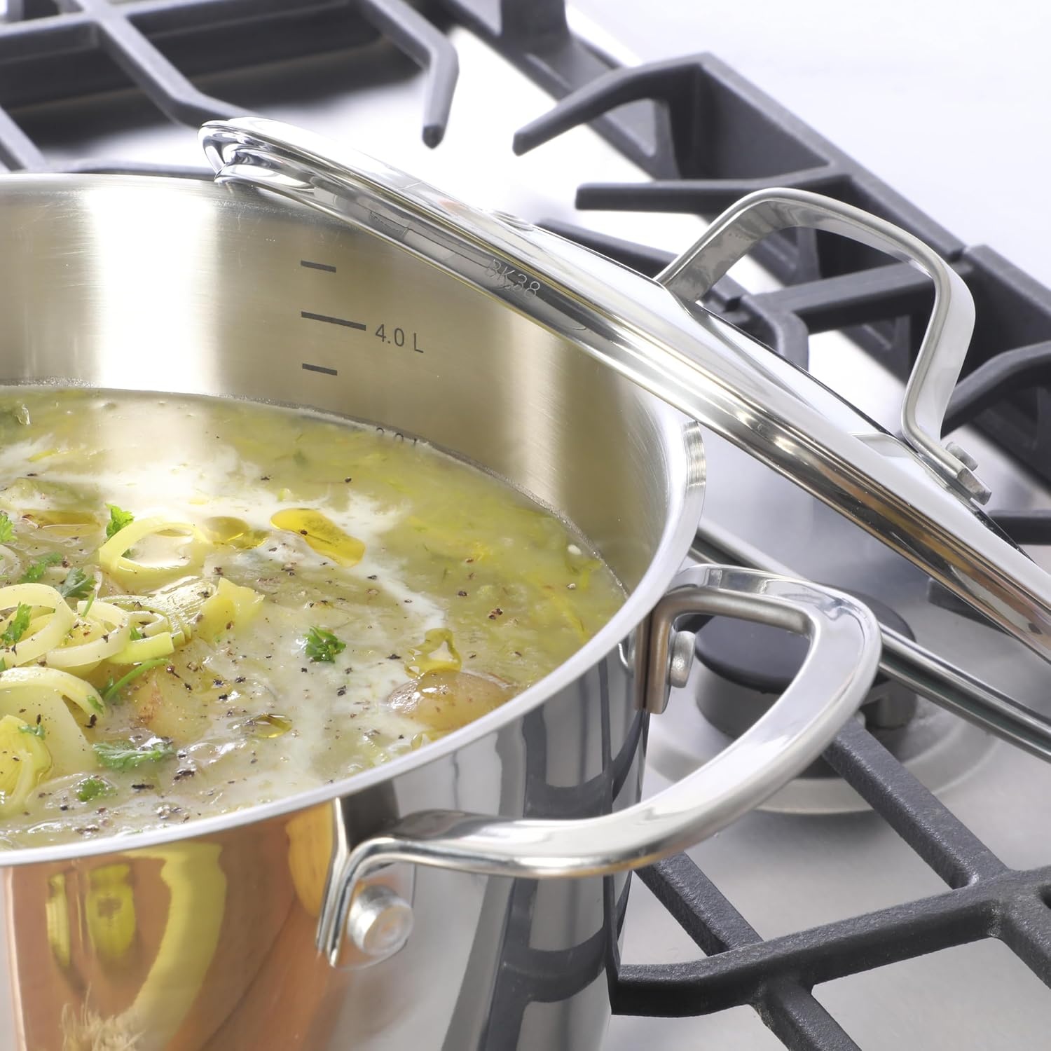 image:imageSur La Table Kitchen Essentials Chefs Deck 3Piece 53Quart Stainless Steel Dutch Oven with Steamer Insert amp Glass Lid Induction Ready TriPly Base Polished Finish amp Hollow StayCool HandlesStainless Steel