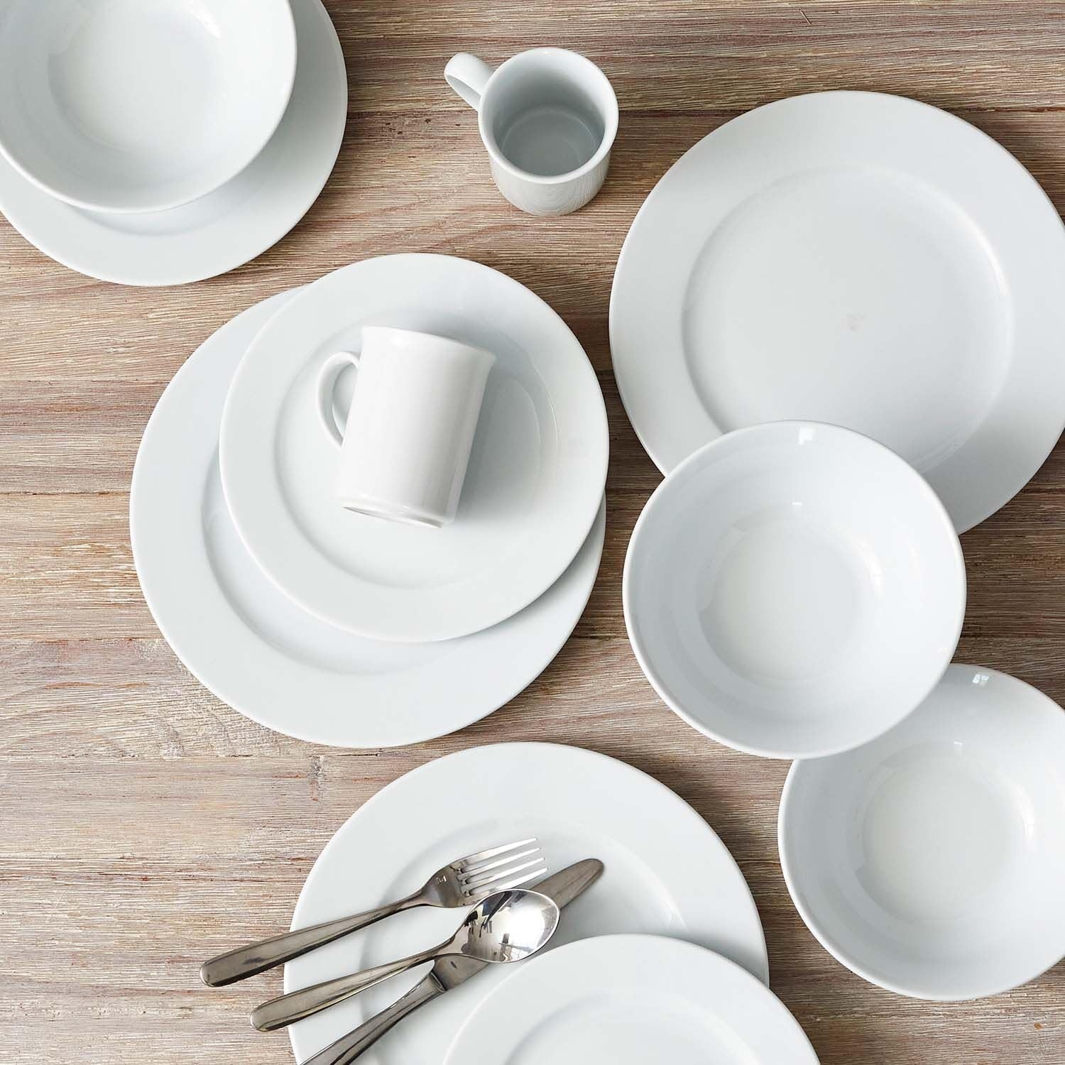 image:imageSur La Table Bistro 24 Piece Porcelain Dinnerware Set includes Dinner Plates Salad Plates Cereal Bowls and Mugs Service for 6 White Microwave and Dishwasher